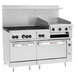 A stainless steel Wolf commercial range with 6 burners, a griddle, and 2 ovens.