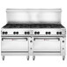 A large stainless steel Wolf commercial gas range with two standard ovens and 12 burners.