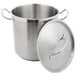 A silver Vollrath stainless steel stock pot with lid.