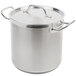A silver Vollrath stainless steel stock pot with a lid.