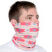 A person wearing a Headsweats neck gaiter with a pattern on it over their face.