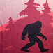 A white Headsweats headband with a black silhouette of Bigfoot walking.