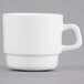 A white Arcoroc stackable mug with a handle.