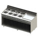 A large stainless steel Blodgett natural gas range with eight burners, a right griddle, and a cabinet base.