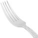 A 10 Strawberry Street Panther Link stainless steel salad fork with a white handle.