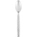 A silver spoon with a white handle on a white background.