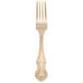 A 10 Strawberry Street Crown Royal stainless steel dinner fork with a gold-plated handle with a design.
