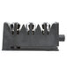 A black plastic Edgecraft knife sharpening module holder with four holes.
