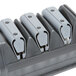 A grey and black Edgecraft Chef's Choice 3 stage knife sharpening module.
