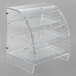 A clear acrylic Vollrath bakery case with three shelves.