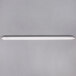 A white tube light on a gray background.
