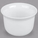 A close-up of a Cambro Classic White Porcelain Ware bowl.