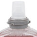 A close-up of a GOJO plastic bottle with a plastic cap.