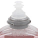 A close-up of a plastic bottle of GOJO Premium Foam Hand Soap with a white cap.
