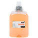 A plastic bottle of GOJO Luxury Orange Blossom foaming hand soap with a white label and cap.