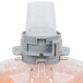 A close up of a plastic bottle of GOJO Luxury Orange Blossom foaming hand soap with a plastic cap.