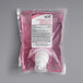 A plastic bag of light pink Kutol Health Guard grapefruit hand soap with a white label.