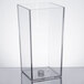 A clear rectangular Cal-Mil plastic beverage dispenser chamber with a lid on it.