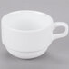 A close-up of a Libbey white porcelain espresso cup with a handle.