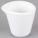A Libbey Aluma white porcelain creamer with a small handle.