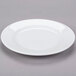 A white Libbey porcelain plate with a circular shape and a rim.