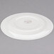A white Libbey porcelain plate with a circular design on the rim.