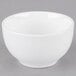 A white Libbey porcelain bouillon bowl on a gray surface.