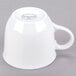 A white Libbey porcelain tea cup with a handle.