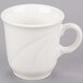 A Libbey ivory porcelain tall tea cup with a white handle.