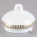 A white bone china tea pot lid with gold accents.