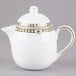 A white Syracuse China Baroque teapot with gold trim and a lid.