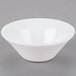 A white Libbey Reflections custard bowl on a gray surface.