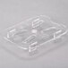 A clear plastic Cambro drain tray with four holes.