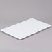A white rectangular GET Melamine adapter plate with squares on it.