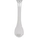 A Reserve by Libbey stainless steel dessert spoon with a Baroque handle.