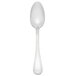 A Libbey stainless steel dessert spoon with a white handle and bowl on a white background.