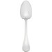 A Libbey stainless steel tablespoon with a white handle.