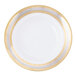A white porcelain soup bowl with a gold rim.