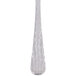 A Libbey stainless steel cocktail fork with a white background.