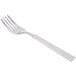 A Libbey stainless steel salad fork with a long silver handle.