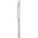 A Libbey stainless steel dinner knife with a solid handle.