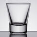 A close-up of a clear Libbey shot glass.