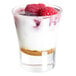 A Libbey customizable shot glass filled with yogurt and raspberries.