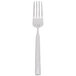 A Libbey stainless steel dessert fork with a white handle.