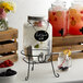 Acopa 2 Gallon Mason Jar Glass Beverage Dispenser with Infusion Chamber, Chalkboard Sign, and Black Stand Main Thumbnail 1