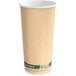 A close-up of an EcoChoice paper hot cup with a white rim and green stripe.