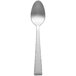 A silver Libbey Conde demitasse spoon.