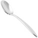 A close-up of a Libbey stainless steel dessert spoon.