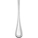 A Libbey Geneva stainless steel serving spoon with a long handle.