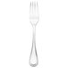 A silver Libbey Geneva utility/dessert fork with a white handle.